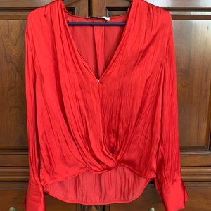 Red wrap front blouse